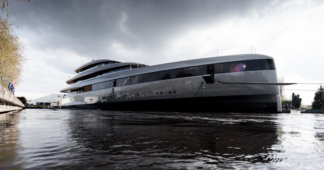 Overview of Feadship Project 710 just after emerging from shed in Aalsmeer. Surorunded by construction facilities.