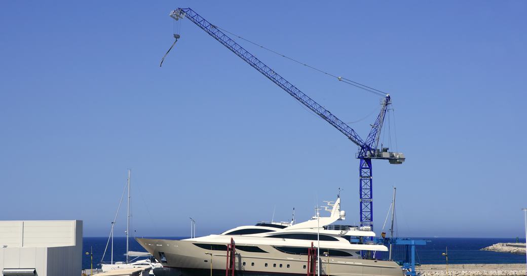 yacht transportation yacht on road trailer in harbour