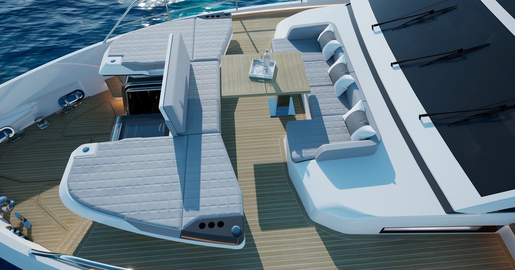 Overview of the Pearl 82 aft deck, sunpads and exterior seating surround an alfresco dining table.