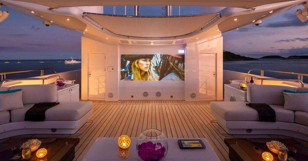 night time outdoor cinema on deck