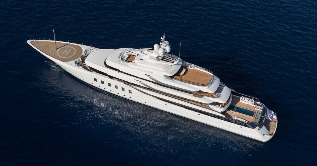 Aerial view of superyacht MADSUMMER, surrounded by sea. 