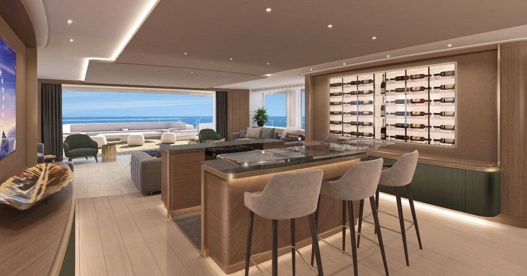 Overview rendering of main salon onboard superyacht ULTRA G. Wetbar central with wall of wine bottles to starboard and view of aft deck in background.