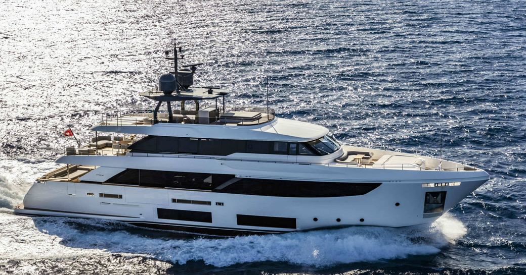 Custom Line Navetta 33 underway, surrounded by sea.