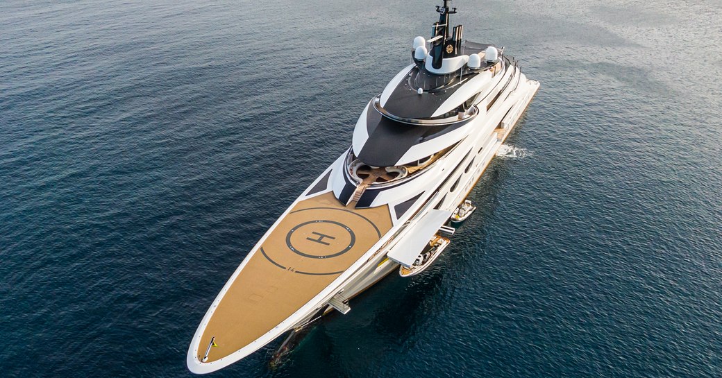 Overview of the helipad onboard superyacht AHPO. Superyacht is surrounded by sea.