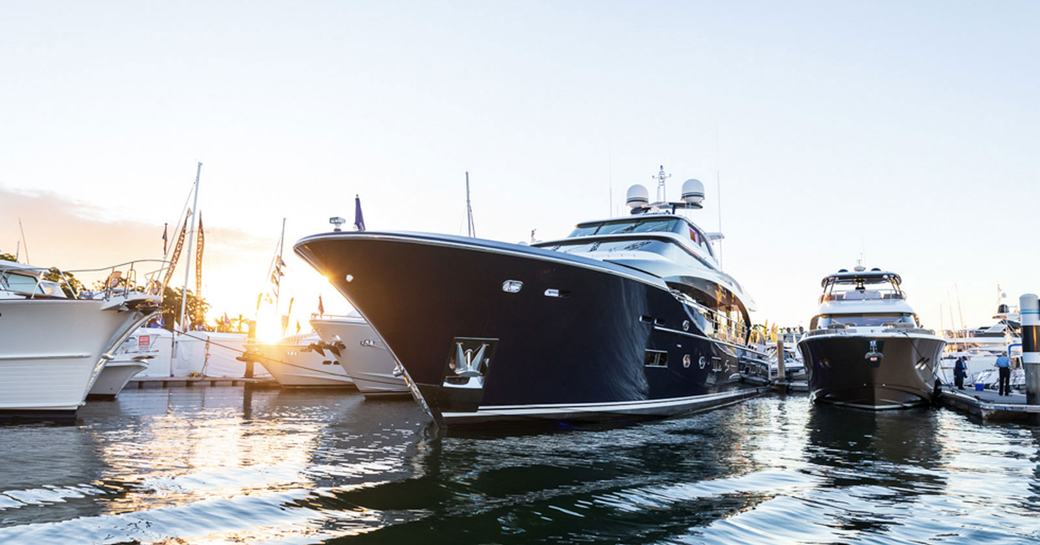 Superyachts moored in marina at Sanctuary Cove International Boat Show.