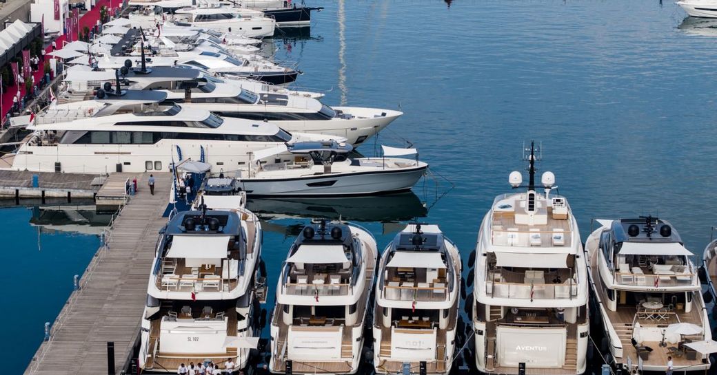 Yachts lined up on the dock at Genoa Boat Show