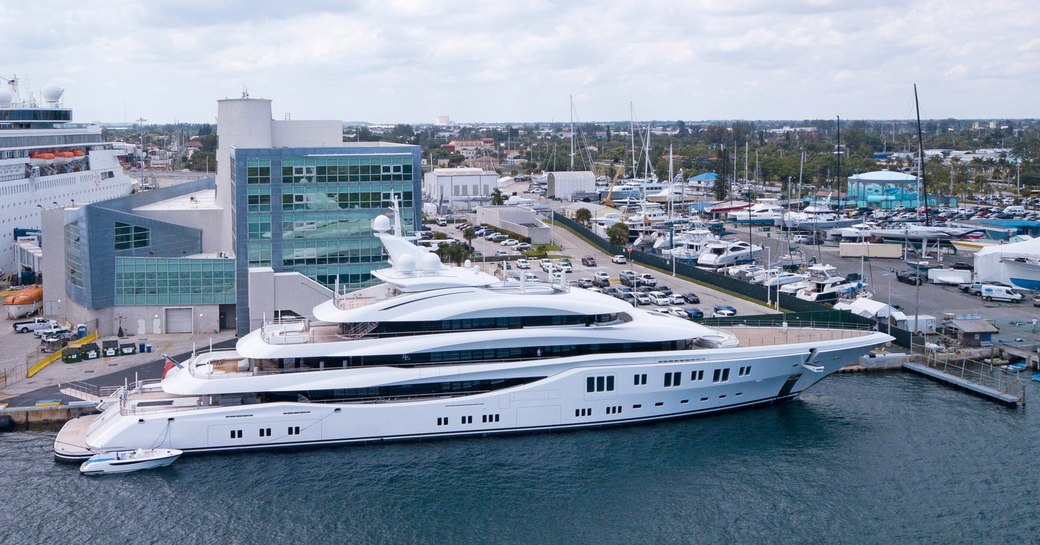 Superyacht moored at Berth One Marina Palm Beach, surrounded by marina infrastructure and smaller yachts moored