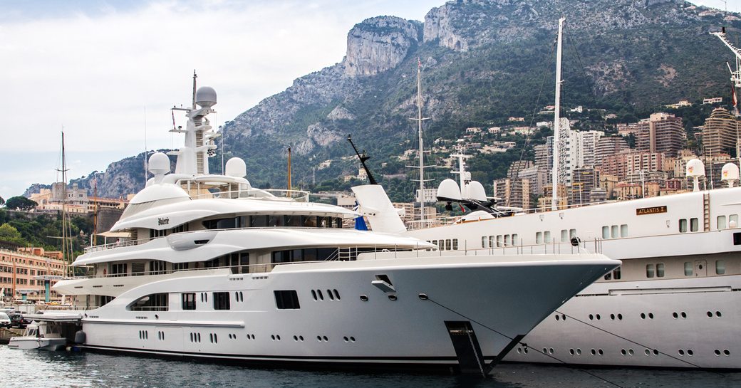 Superyacht Meridian A berthed in European marina.