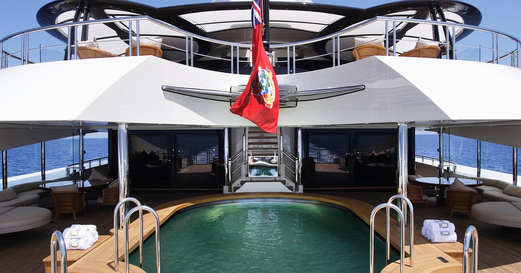 Exterior swimming pool on the aft deck onboard superyacht AV. 