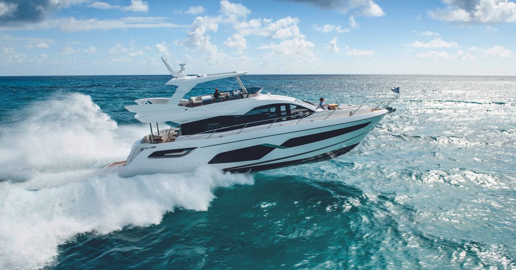 Sunseeker Manhattan 68 underway, surrounded by sea