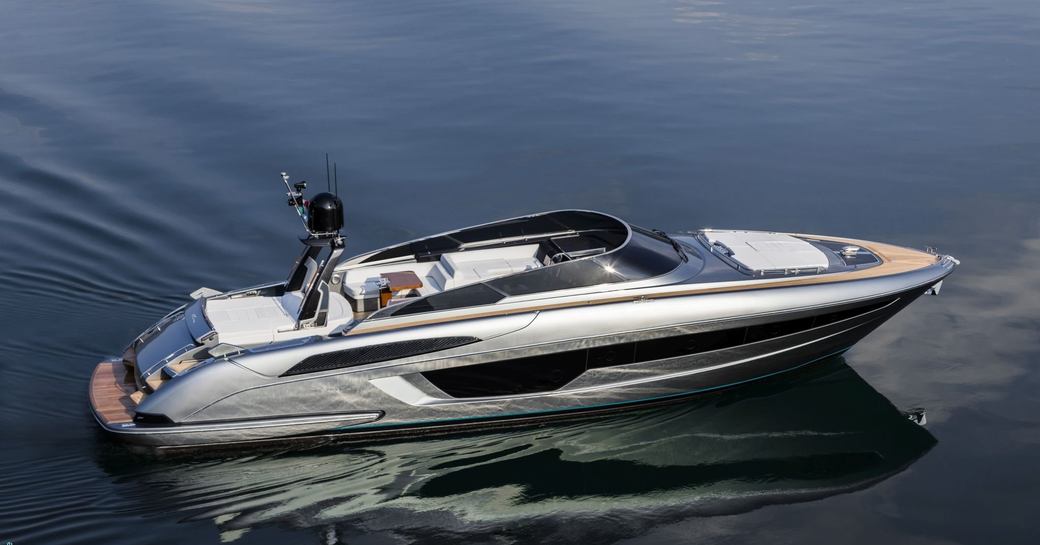 Riva 56 Rivale rendering surrounded by water.