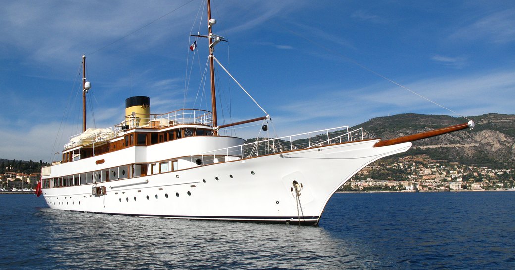 classic motor yacht on anchor