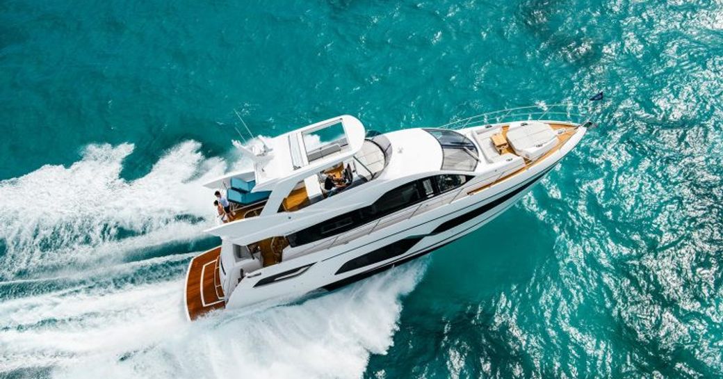 Aerial view of Sunseeker Manhattan 68 underway, surrounded by sea