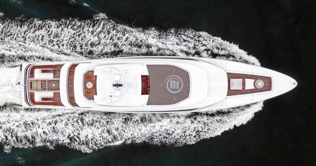 Bird eye view of the Amels Custom 78 superyacht underway, surrounded by sea.