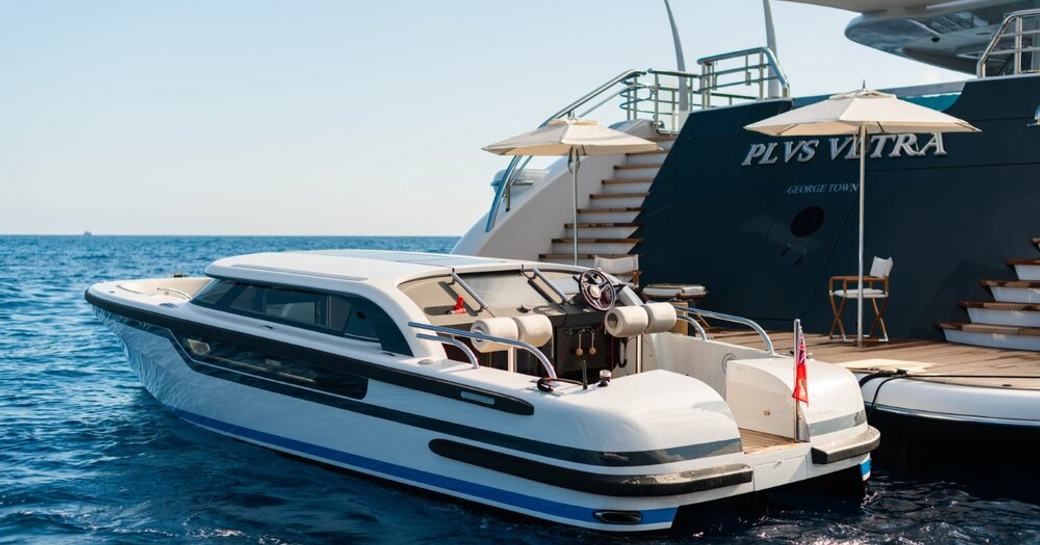 Pascoe SL Limousine tender on water at rear of superyacht