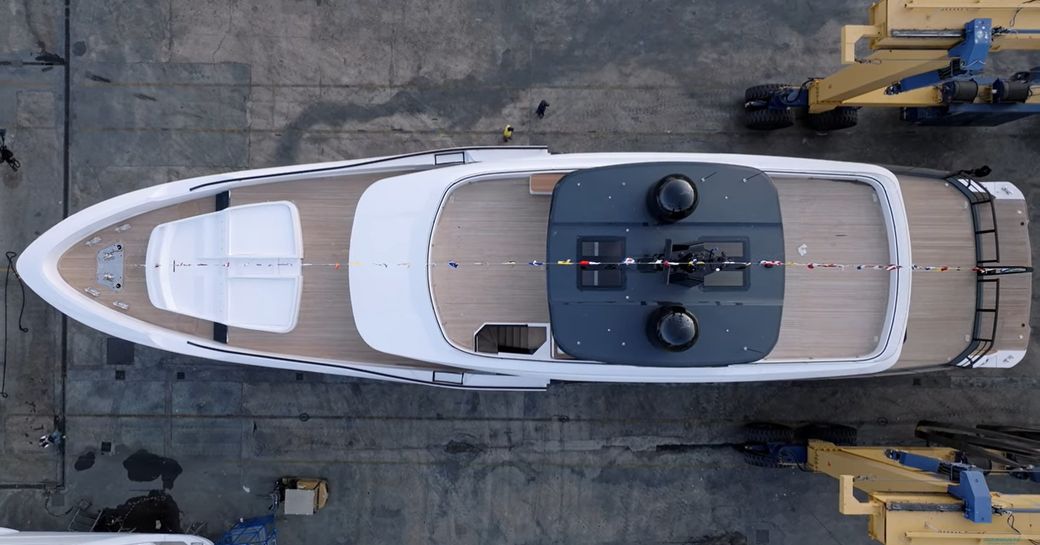 Aerial view looking down onto Oceano 39 emerging from construction shed