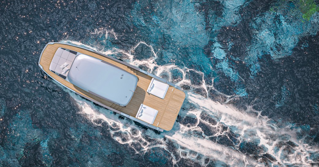 Aerial view of Sunreef 55 Power, looking down on vessel underway, surrounded by sea.