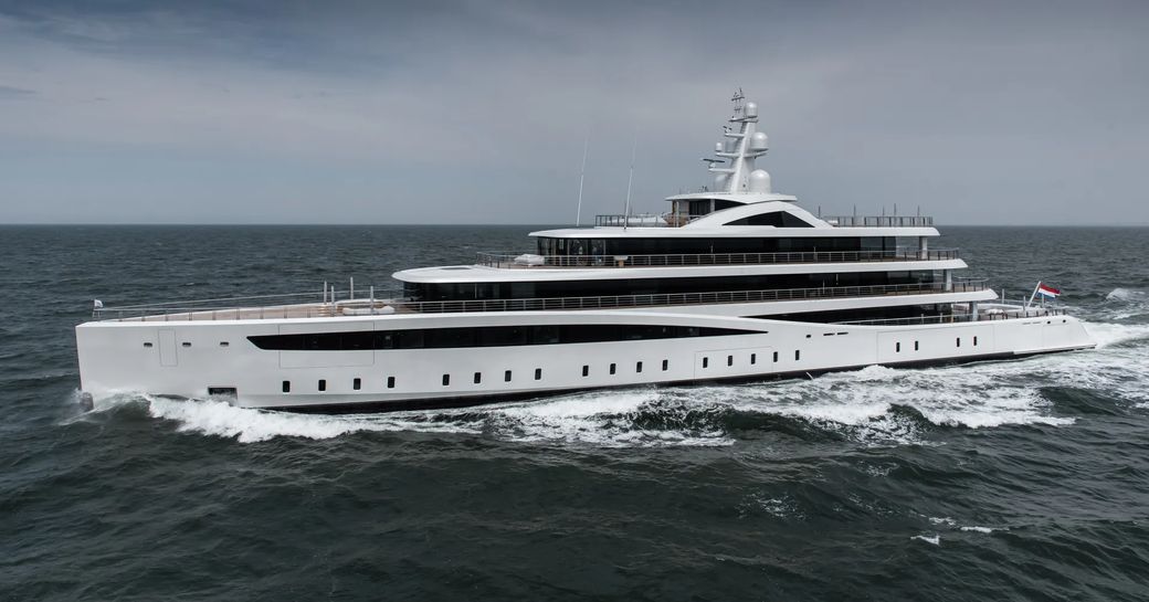 Superyacht VIVA underway, surrounded by sea.