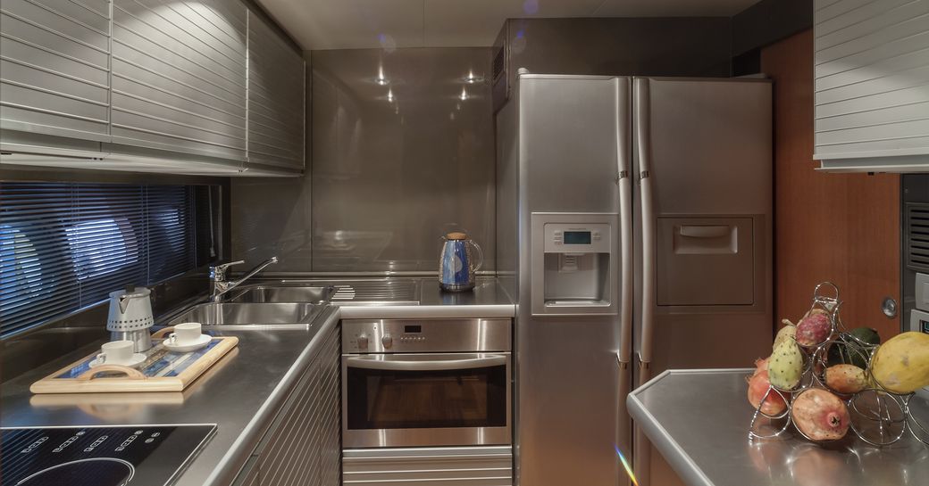 Galley on yacht, with stainless steel units