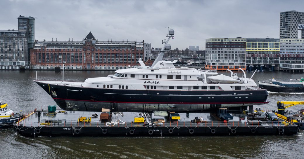 Superyacht AMARA being transported on river