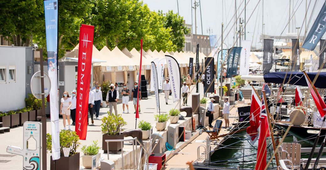 People walking along docks at Palma Superyacht Show