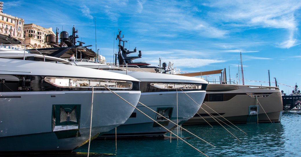 MYS 2024 bows of yachts lined up, on sunny day