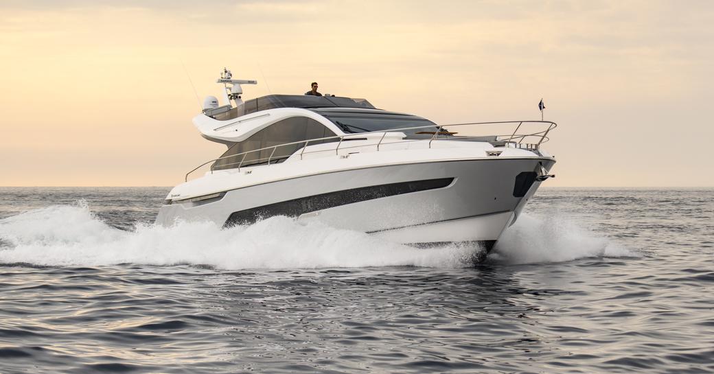 Fairline Phantom 65 underway, surrounded by sea.