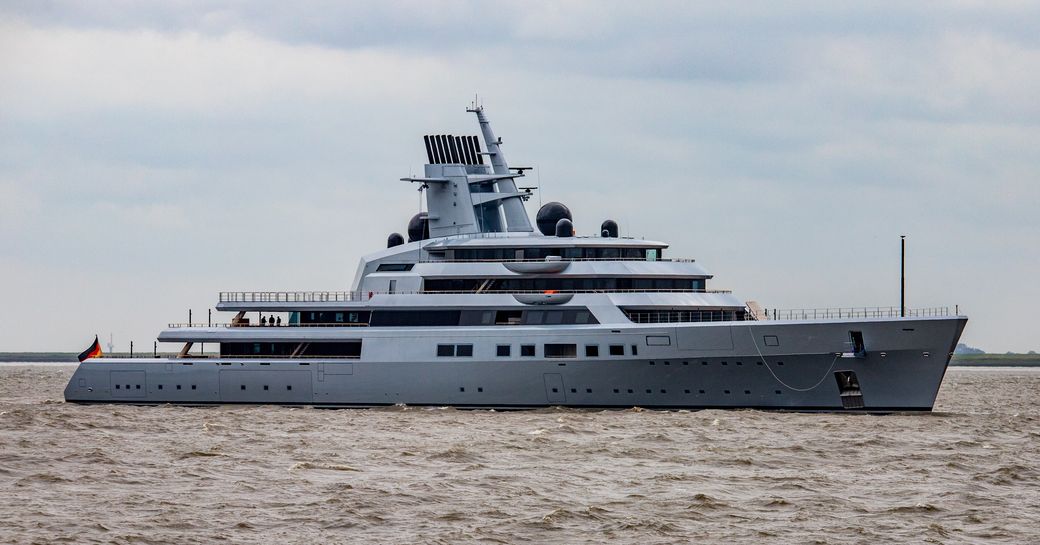 Lurssen yacht Project Ali Baba on sea trials, moderate sea, cloudy day, water level shot towards starboard side profile