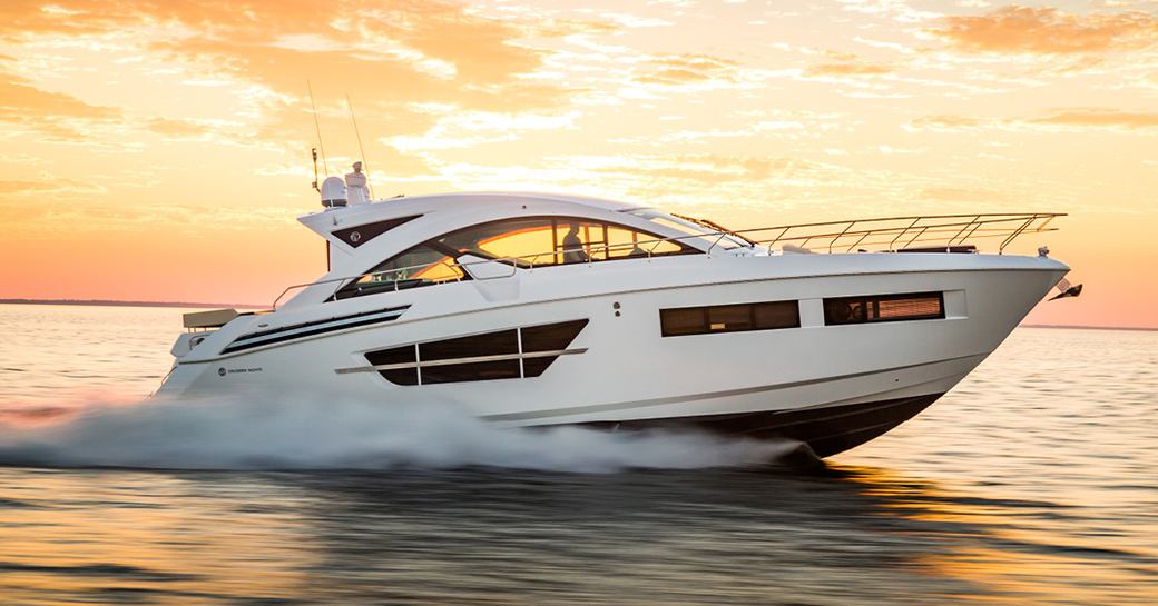 Cruisers Yachts 60 Cantius moving at speed on water