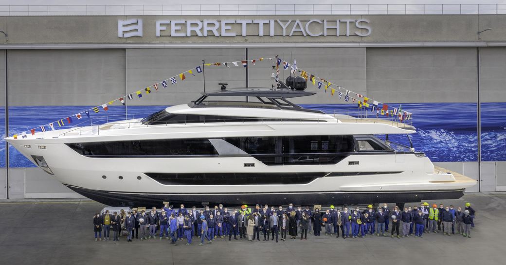 Ferretti Yachts 1000 outside Ferretti yard with staff in front of it