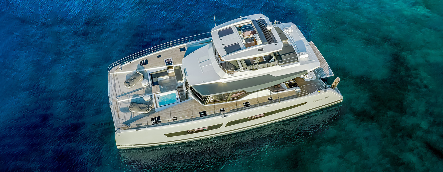 Fountaine Pajot Power 67 aerial shot over port side, still waters