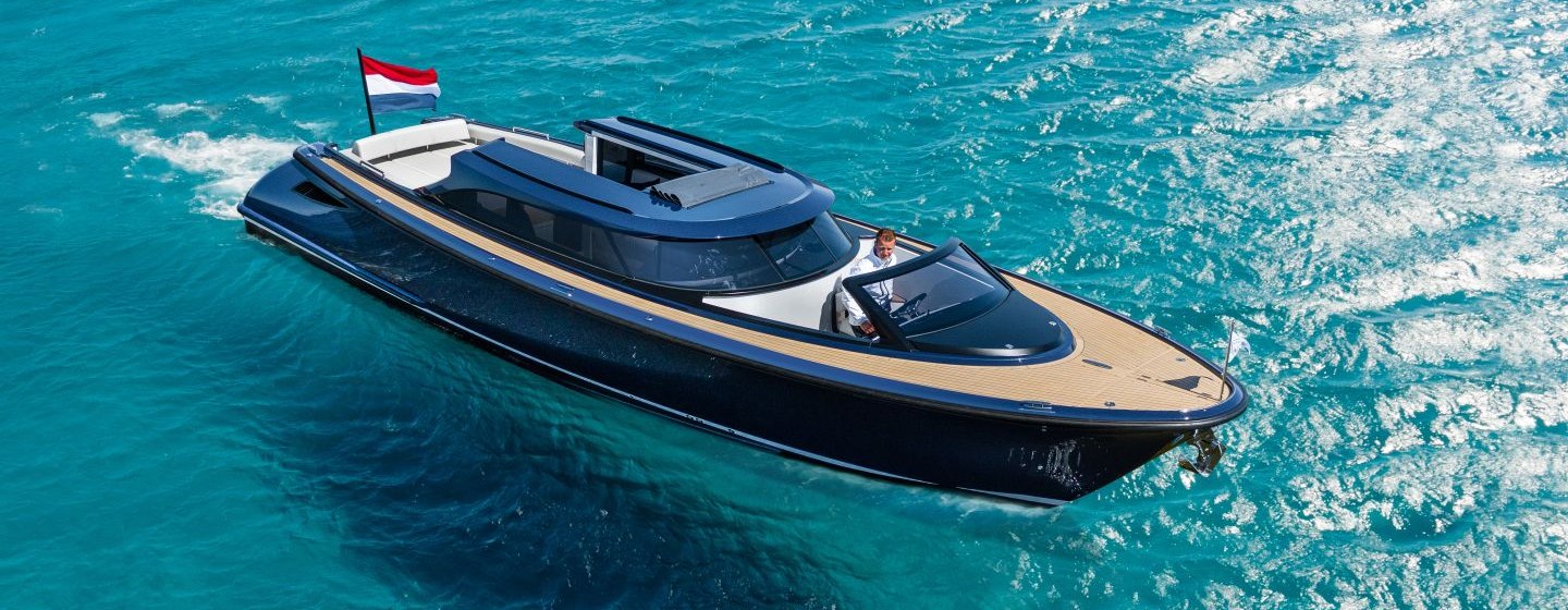 Elegant open tender boat stationary on clear water