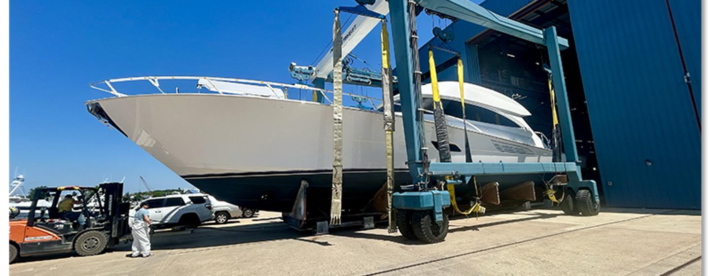 Viking 90C Sportsfisher Yacht on trolley on way to launch