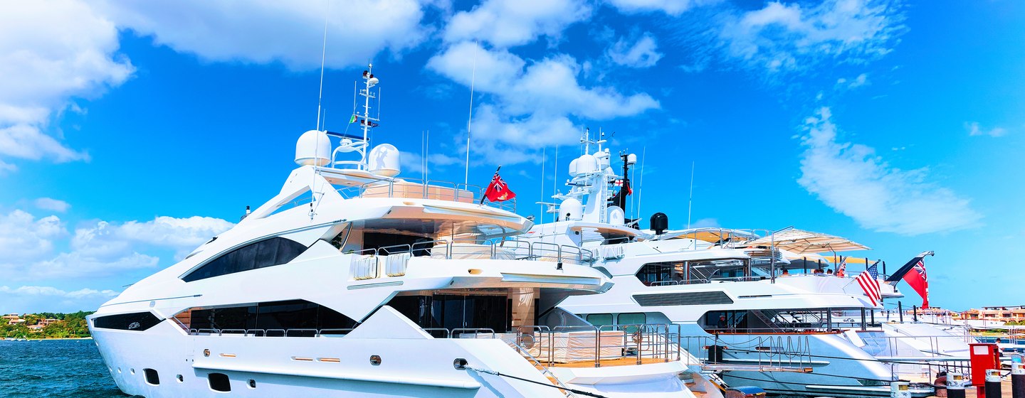 motor yachts moored stern to on jetty