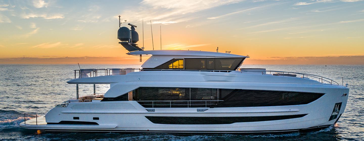 Horizon FD90 Skylounge motor yacht underway side view 