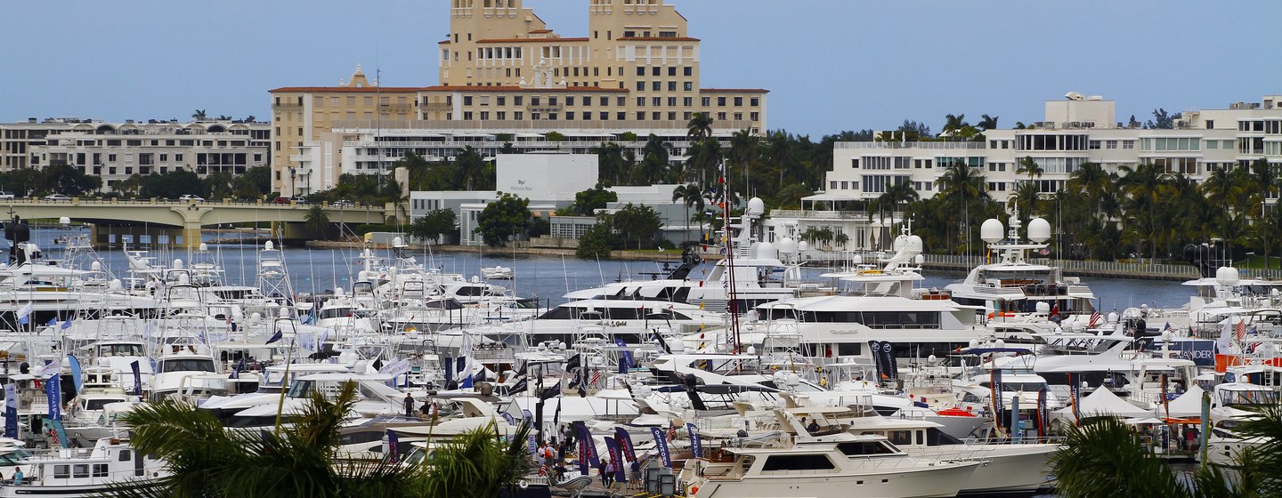 Overview of Palm Beach International Boat Show, hundreds of motor yachts moored in marina