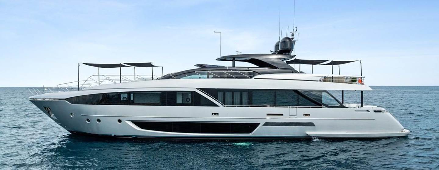 Riva motor yacht Riva Royale at anchor side view 