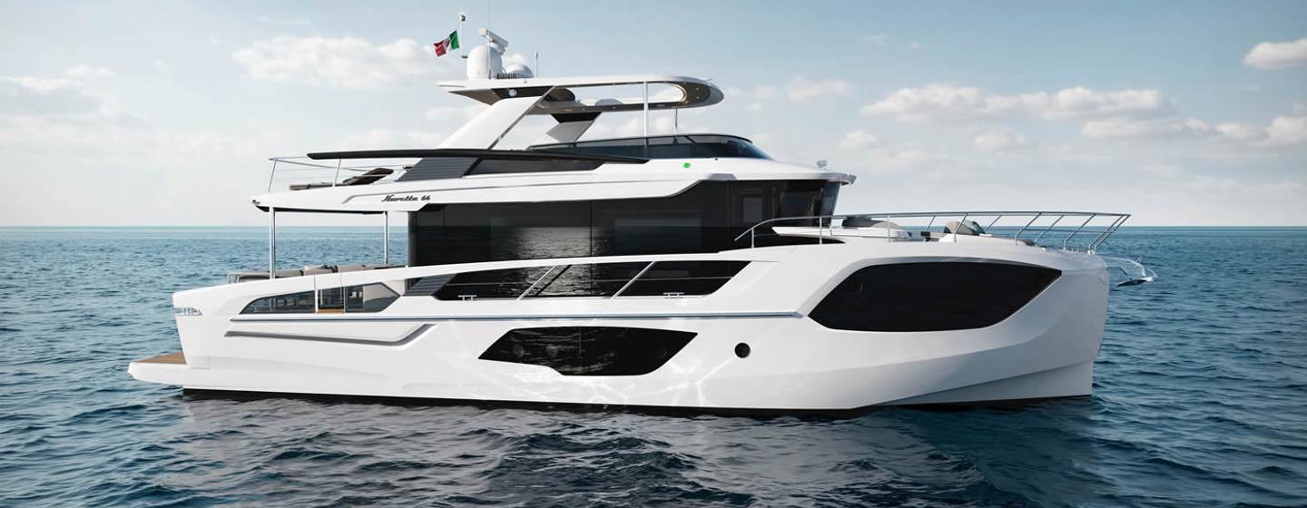 Absolute Navetta 66 motor yacht at anchor side view 