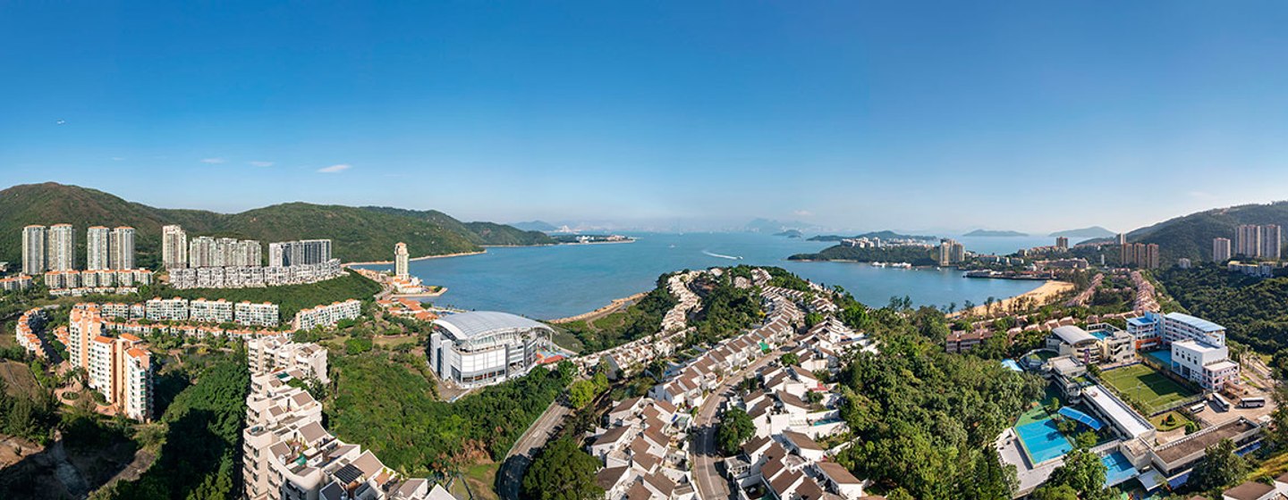 Aerial view of Discovery Bay, Lantau Yacht Club, with sea on horizon