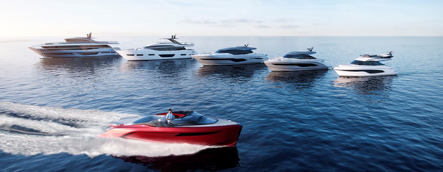 Princess yachts lined up in water, surrounded by sea.