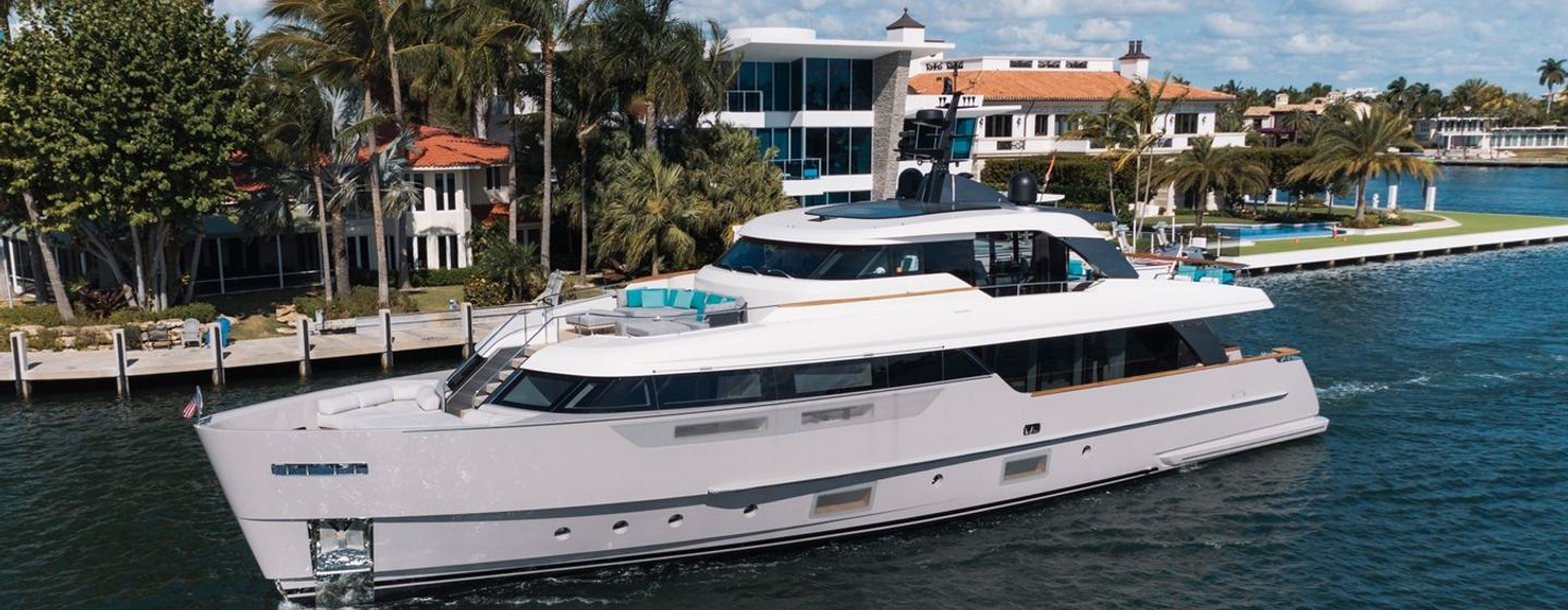 Motor yacht Don't Tell Mom docked in harbour