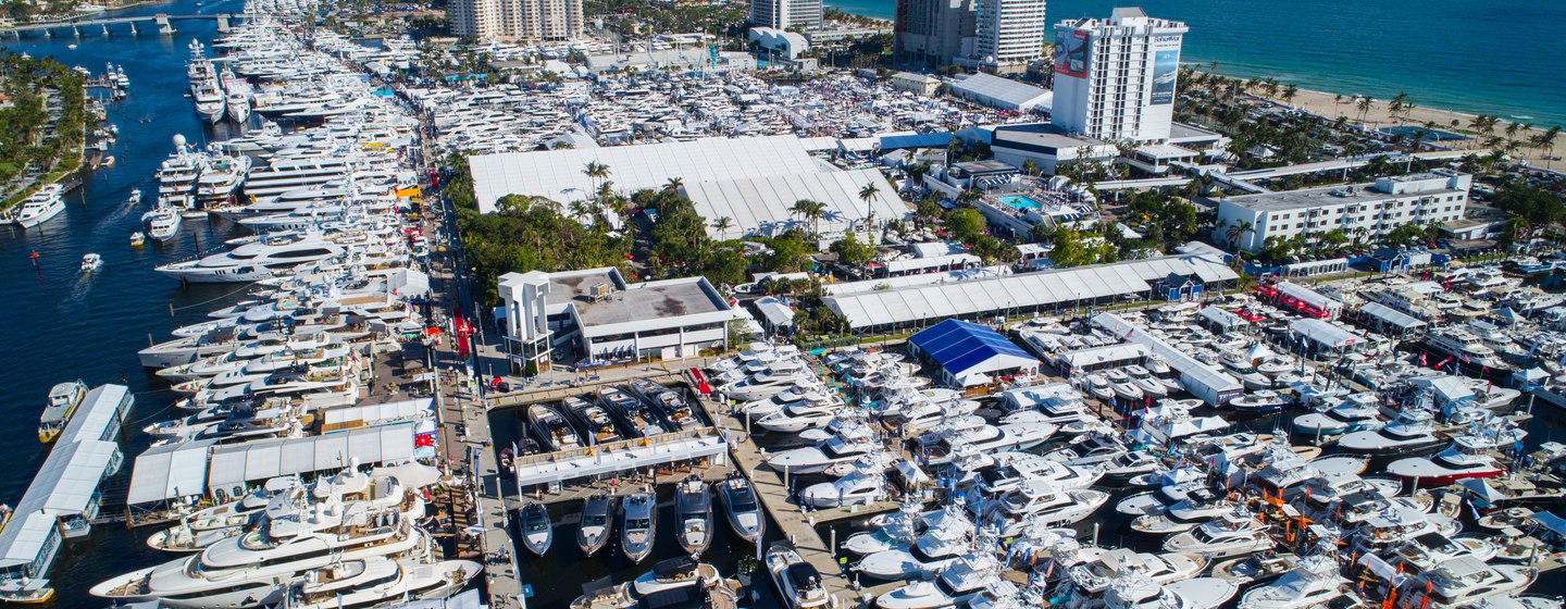 Aerial view of FLIBS, hundreds of motor yachts at anchor surrounded by sea and Fort Lauderdale