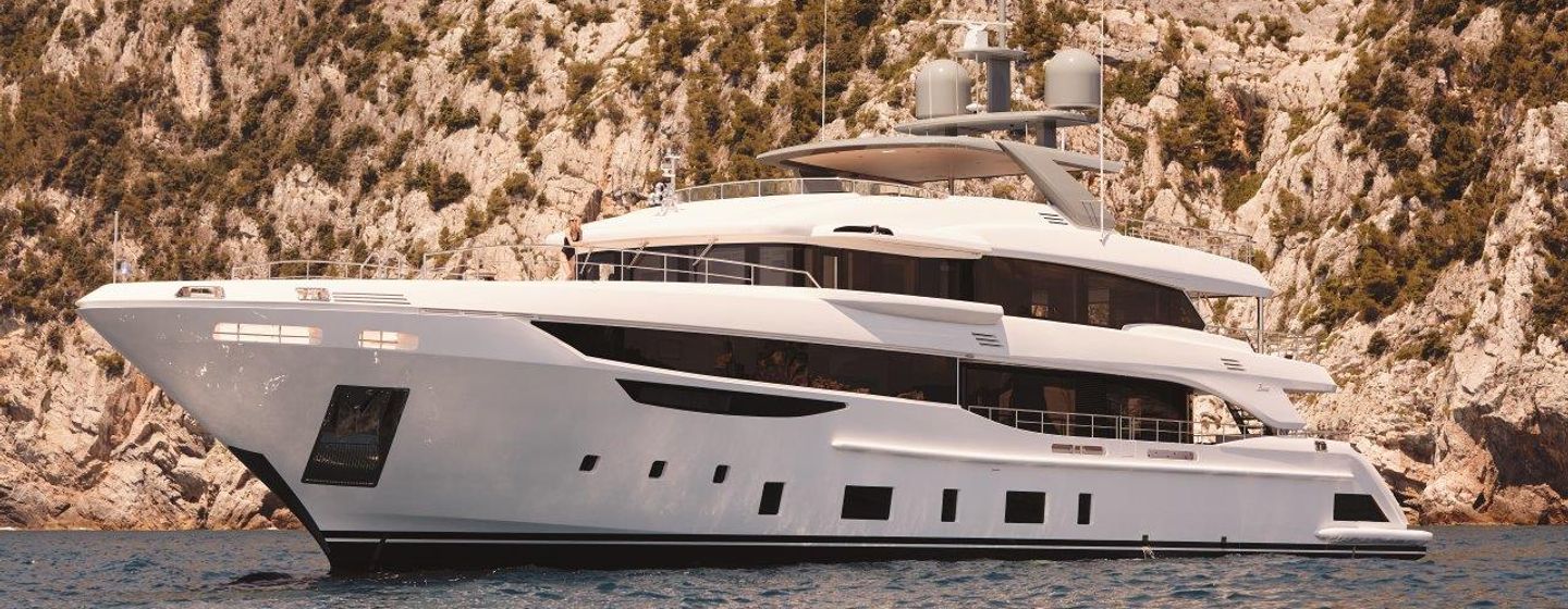 Benetti Diamond 145 INK superyacht on sea with cliffs in background