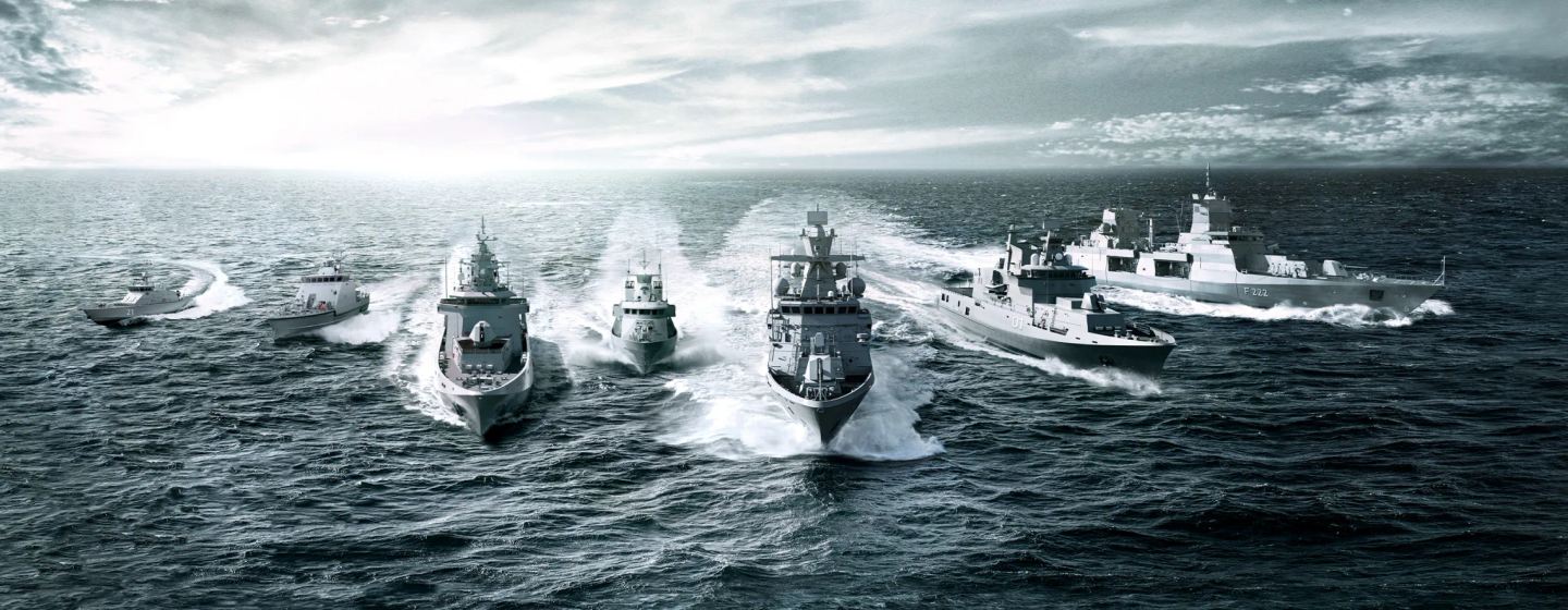 Various ships underway in stormy sea