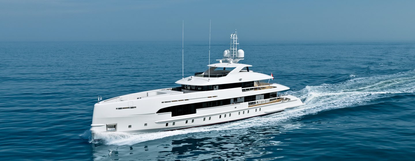 Side view of Heesen AMARE II underway surrounded by sea