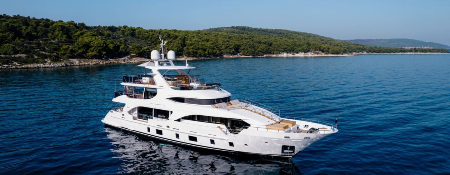 Benetti motor yacht Afina at anchor side view 
