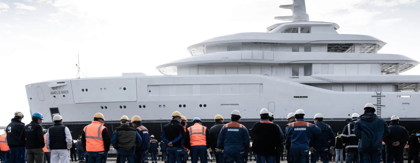 Damen wokers gather in front of Amels 8003 in Netherlands