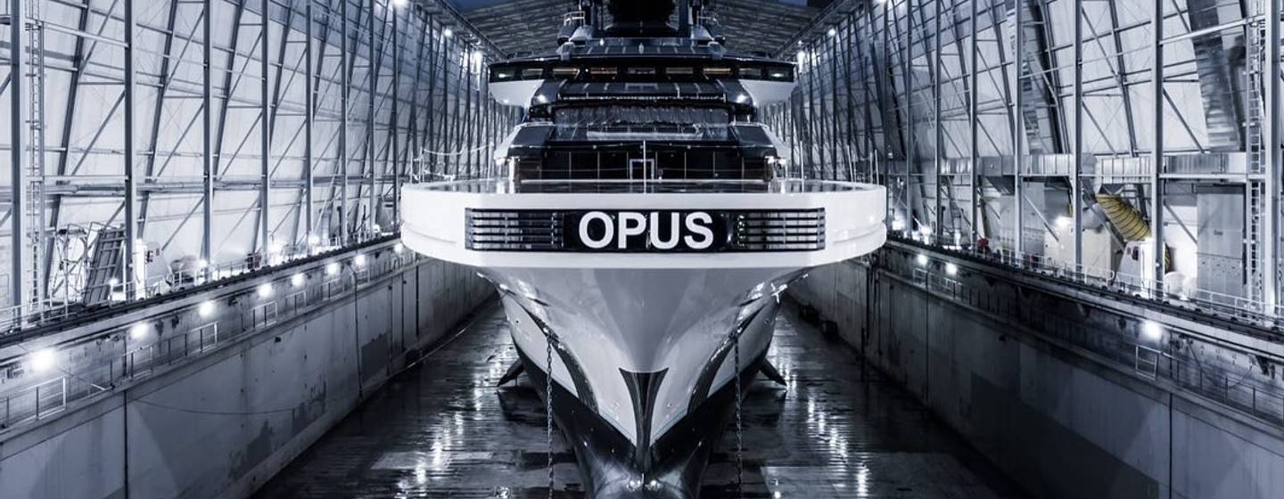 Lürssen Project Opus in shipyard at night