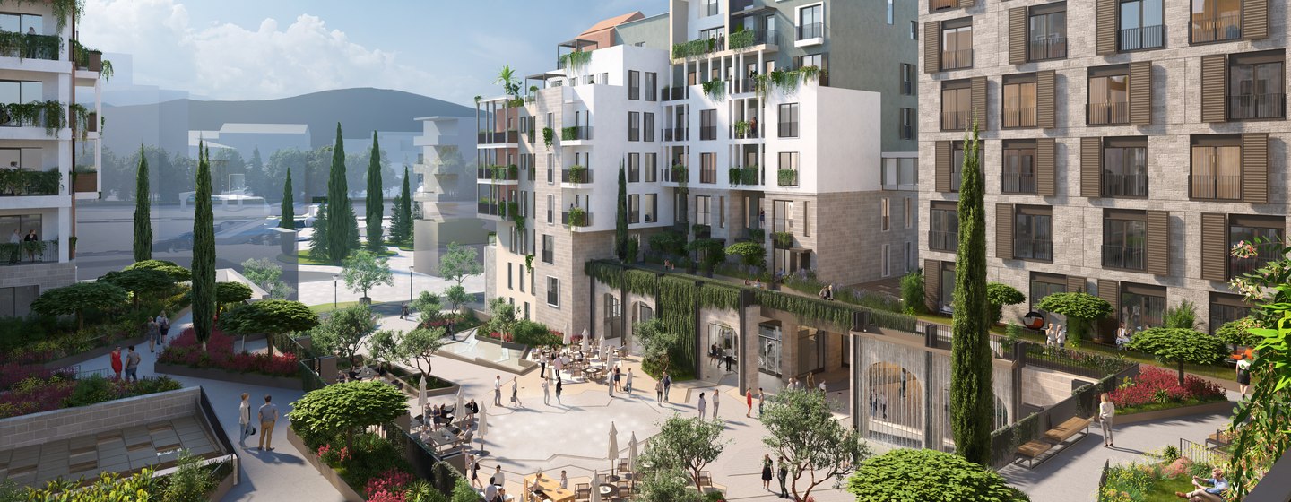 Porto Montenegro Boka Place overview, blocks of flats with open courtyards and abundant shrubs