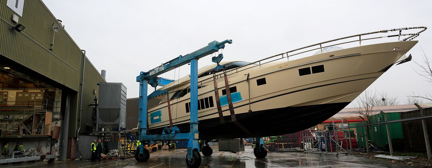 Fairline yacht leaving shed